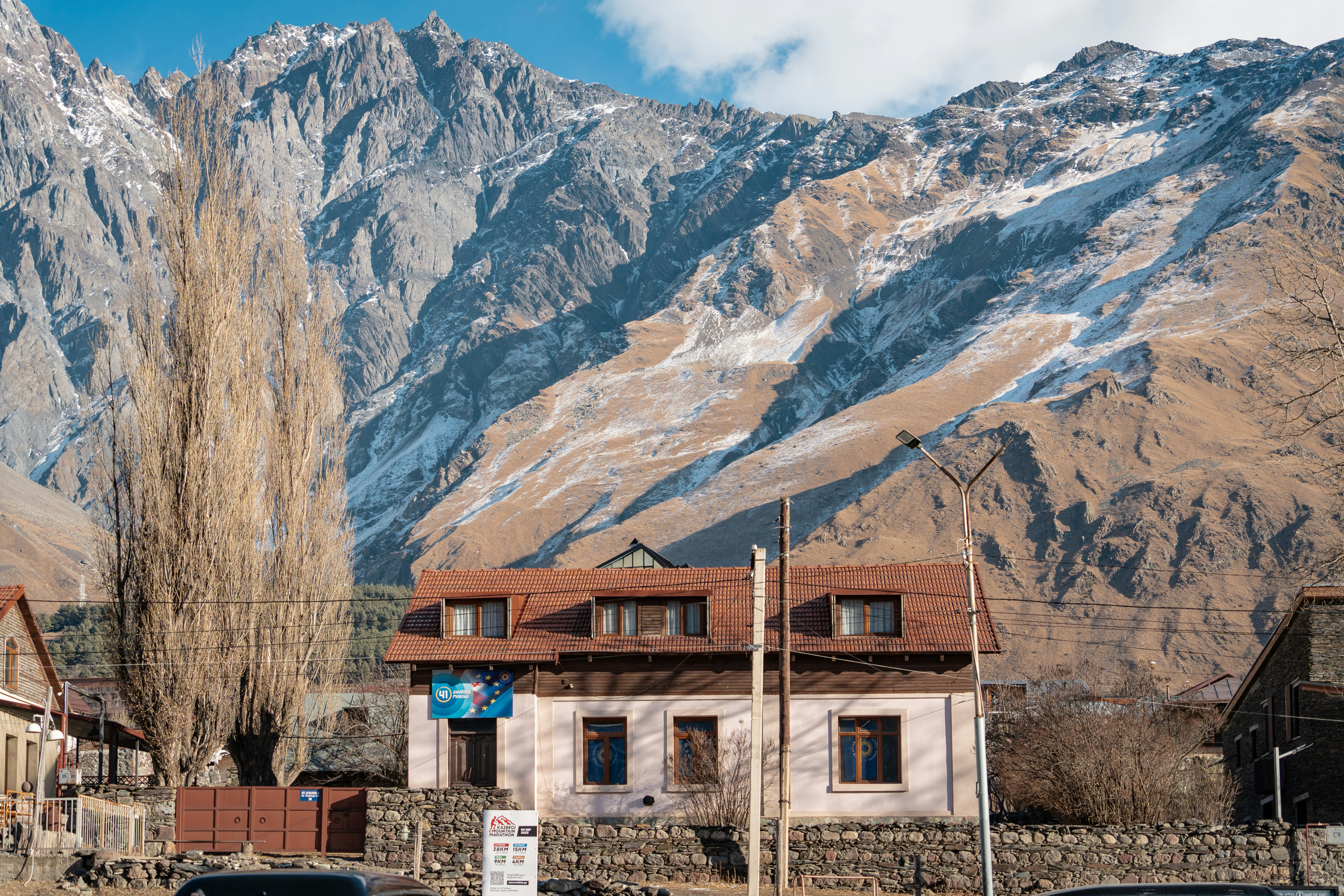 House with mountain backdrop